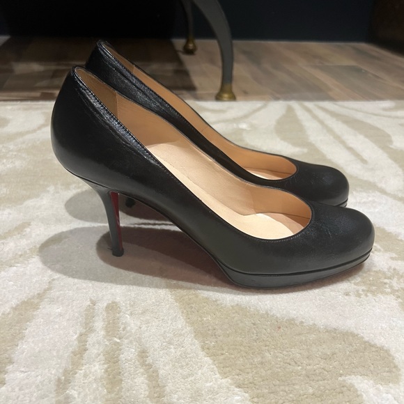 Christian Louboutin - Picture 1 of 4